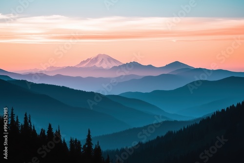 A mountain range with a beautiful blue sky in the background