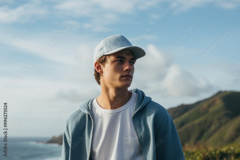 A man wearing The denim cap portrait contemplation tranquility. A man wearing The denim cap portrait contemplation tranquility.