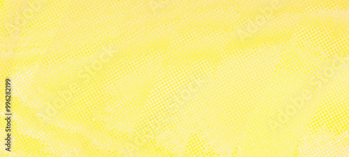 Plain yellow textured gradient widescreen background. Suitable for banner, poster, advertising. and various other design works