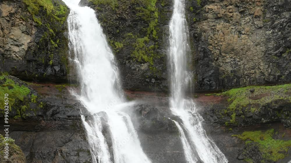 Beautiful waterfall over natural rocks, north Iceland Beautiful waterfall over natural rocks, north Iceland