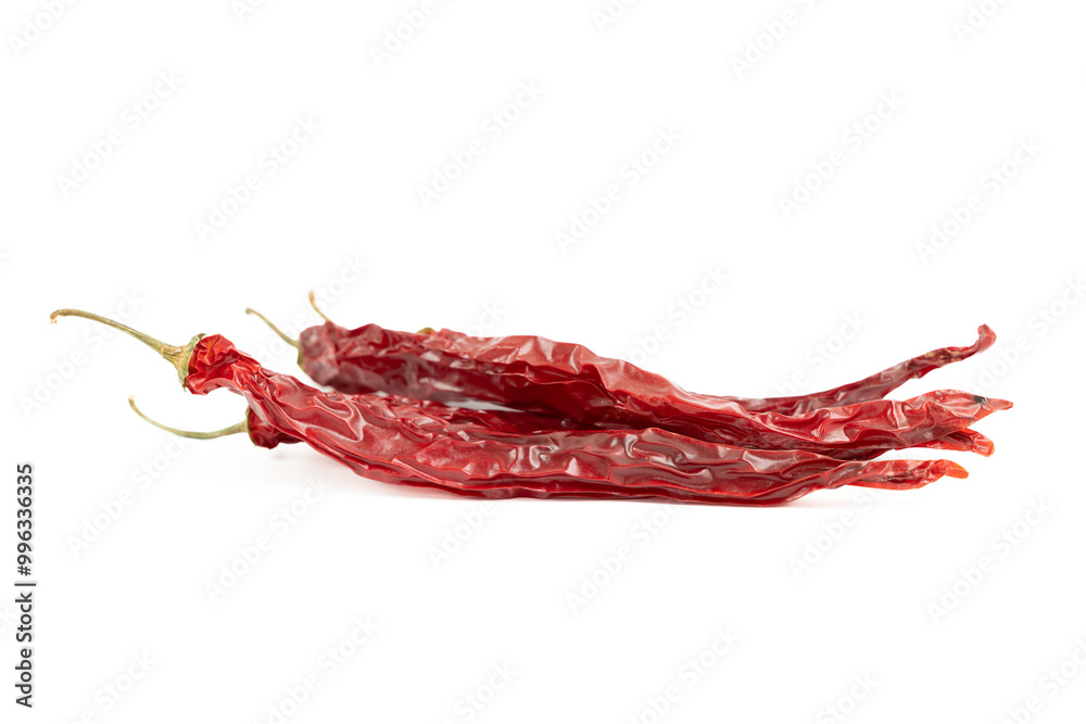 Dried hot chili peppers on white background Dried hot chili peppers on white background