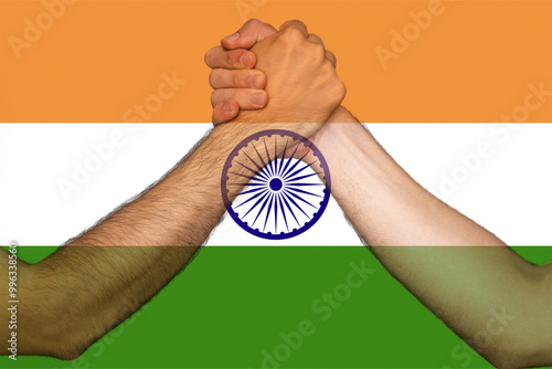 Two hands gathering front of India flag, togetherness and solidarity concept, human rights, help 