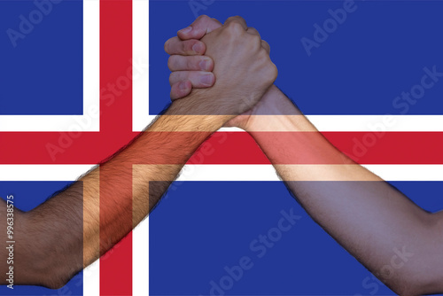 Two hands gathering front of Iceland flag, togetherness and solidarity concept, union of society