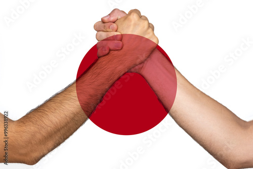 Two hands gathering front of Japan flag, human rights, union of society, help or support for Japan