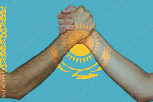 Two hands gathering front of Kazakhstan flag, union of society, help or support for Kazakhstan