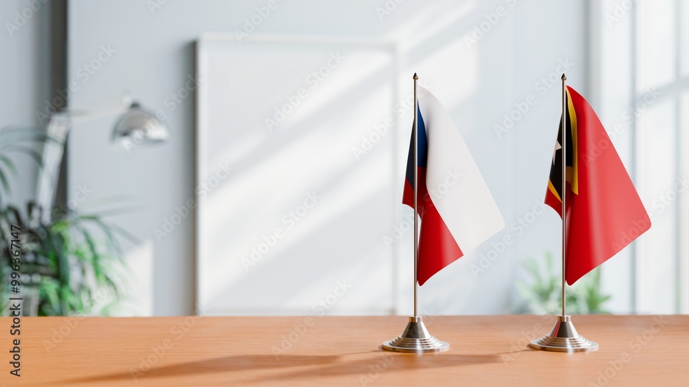 FLAGS OF CZECH REPUBLIC AND EAST TIMOR ON TABLE FLAGS OF CZECH REPUBLIC AND EAST TIMOR ON TABLE