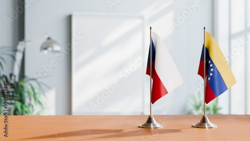 FLAGS OF CZECH REPUBLIC AND VENEZUELA ON TABLE