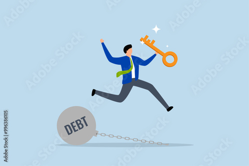 freedom for pay off debts, Content businessman holding a golden key in happiness after unlocking a chain burdened by debt.