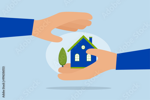 House insurance, businessman holds the house in his hand while using his other hand to provide protection like insurance.