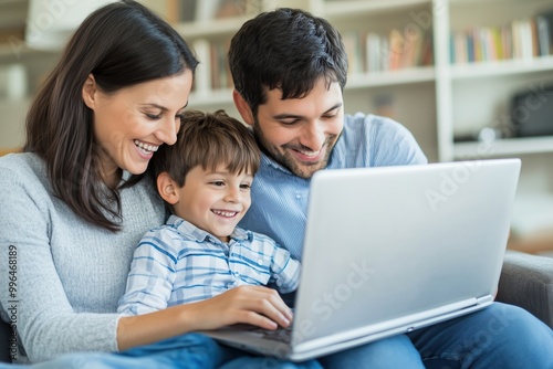 A family of three, a man, a woman and a child, are sitting on a couch