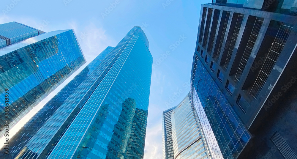 Glass office buildings. Skyscrapers in the business center. Architecture, residential real estate Glass office buildings. Skyscrapers in the business center. Architecture, residential real estate