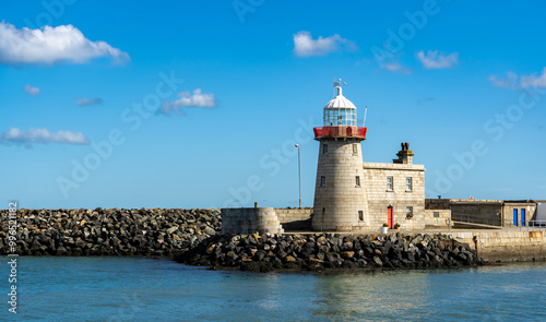 Beautiful seascape - Howth lighthouse with boat
