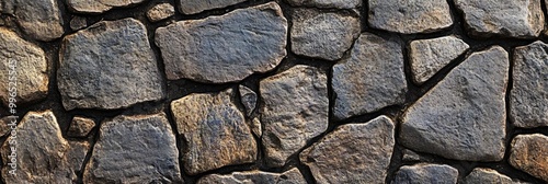 Cobblestone street texture, with uneven stones and weathered surfaces