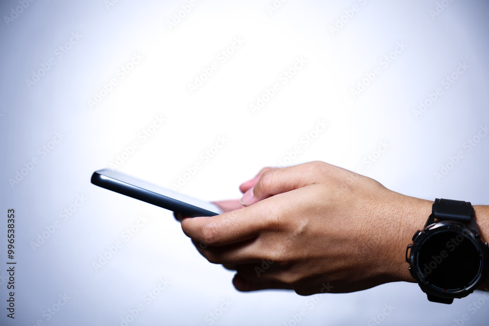 Hand holding smartphone on white background. QR code payment concept. Digital money payment. Hand holding smartphone on white background. QR code payment concept. Digital money payment.
