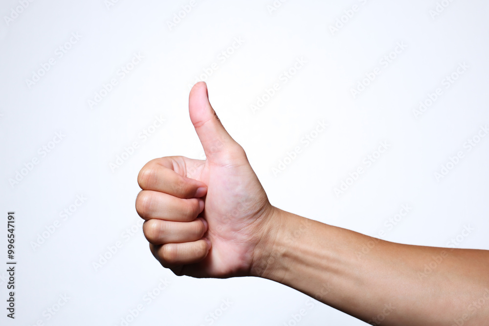 Hand of man showing thumb-up gesture on white background. Hand of man showing thumb-up gesture on white background.
