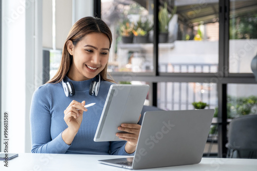 Businesswomen bookkeepers use tablet to analyze the graph to set challenging business goals and be ready to achieve targets at home