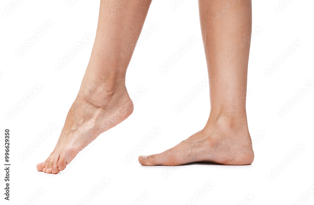 Woman with smooth feet on white background, closeup