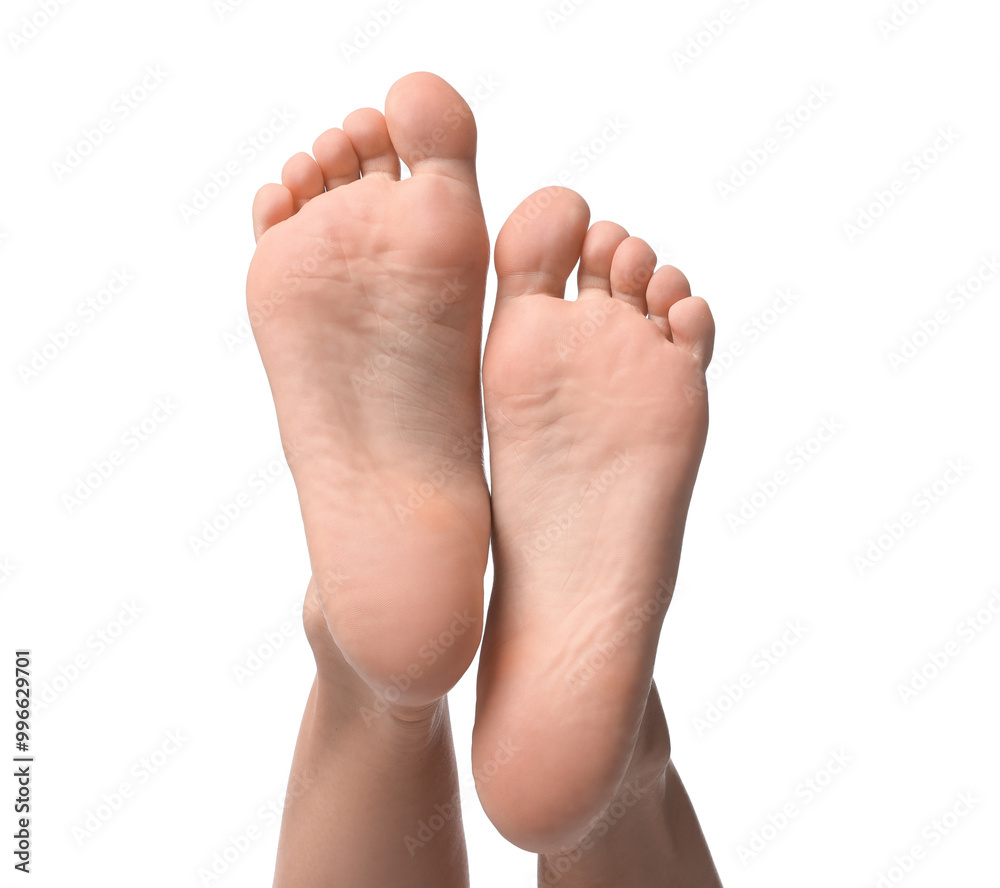 Barefoot woman on white background, closeup view