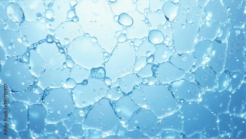 青い背景の上に敷き詰められた氷のテクスチャー素材　清涼感のあるクラッシュアイス　Ice texture material spread over a blue background. Refreshing crushed ice