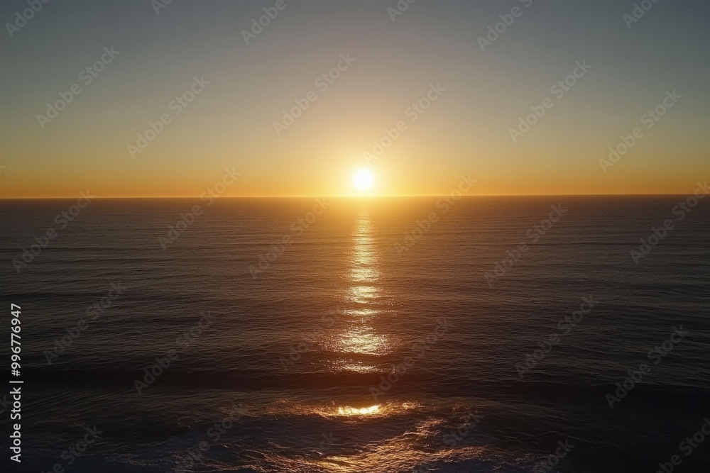 Stunning sunset over calm ocean waves, vibrant colors reflecting on water. Stunning sunset over calm ocean waves, vibrant colors reflecting on water.