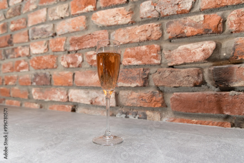 champagne drink glass counter sill interior home brick wall background loft minimalism space photo