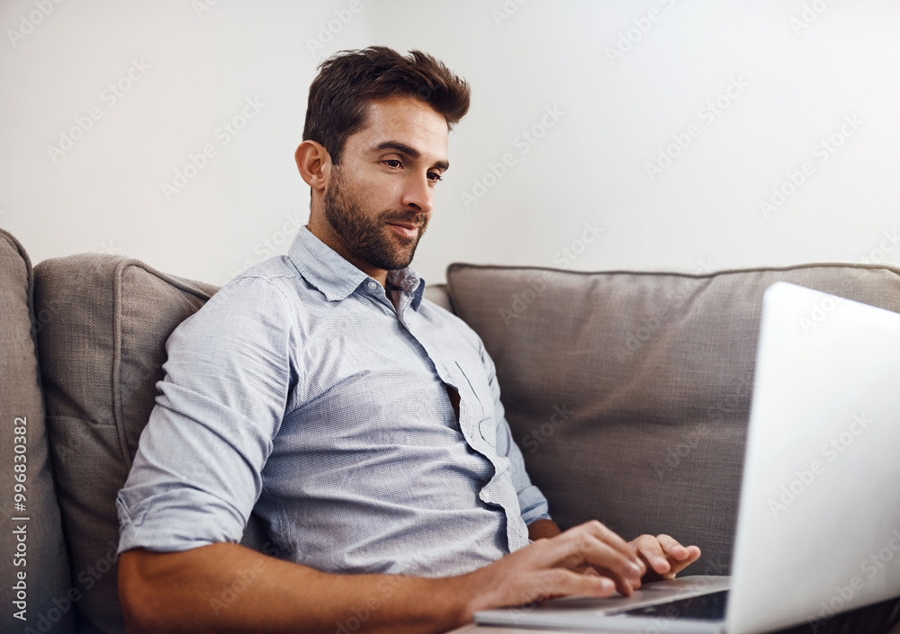 Sofa, remote work or man on laptop for research, entrepreneurship or website for browsing. Typing, internet and networking for freelancing opportunity, reading news or business application in home Sofa, remote work or man on laptop for research, entrepreneurship or website for browsing. Typing, internet and networking for freelancing opportunity, reading news or business application in home