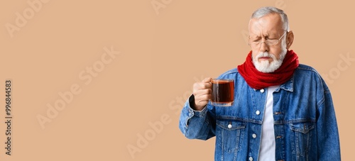 Ill old man with hot tea on...