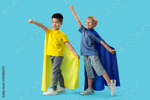 Cute little boys with super...
