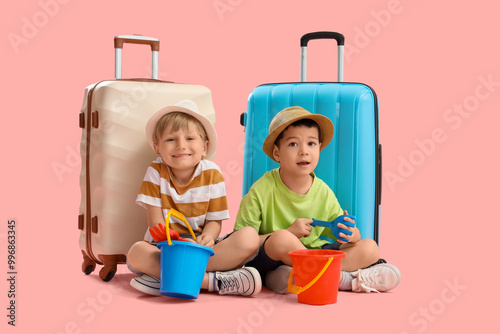 Cute little boys with beach...