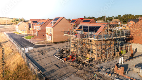 Aerial view of eco friendly and energy efficient homes under construction