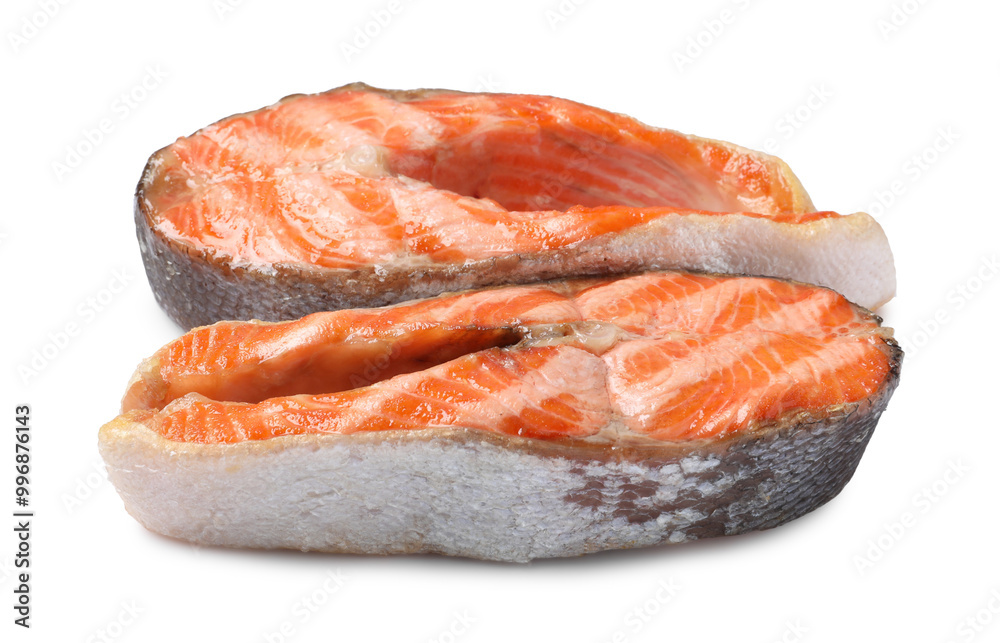 Tasty grilled salmon steaks isolated on white Tasty grilled salmon steaks isolated on white