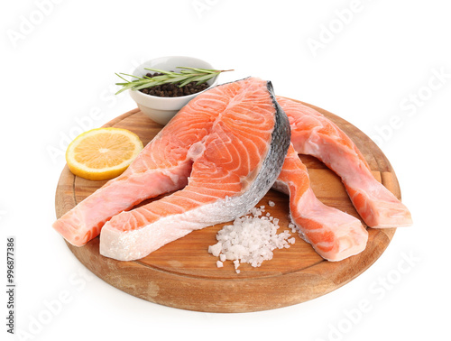 Fresh raw salmon steaks wit...