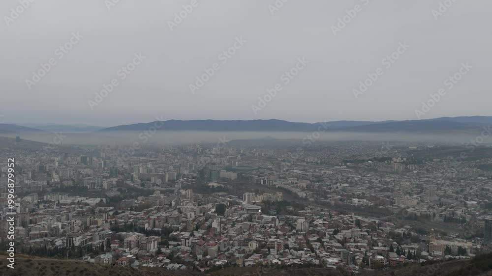 Aerial View of Urban Skyline Covered in Smog and Haze Aerial View of Urban Skyline Covered in Smog and Haze