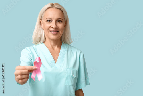 Mature female doctor with p...