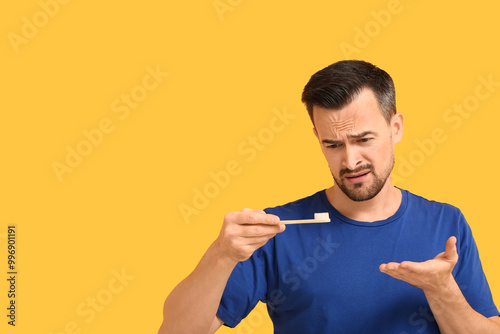 Displeased young man with t...