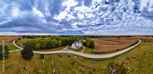 Country church and cemetery. Wheeler Grove in Iowa.