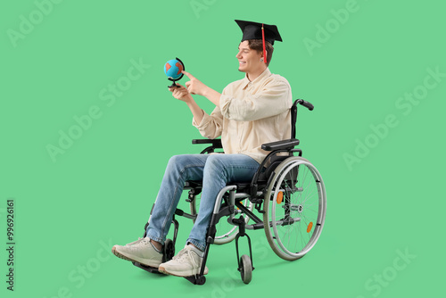 Male graduate in wheelchair...