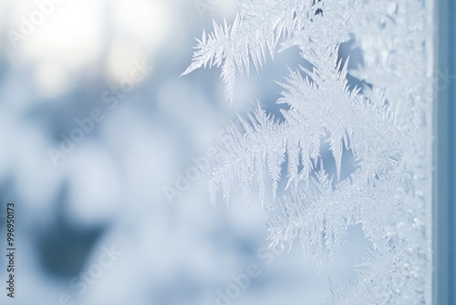 Crystallized frost texture on a windowpane, capturing intricate, sharp edges