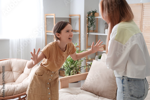 Angry teenage girl arguing ...