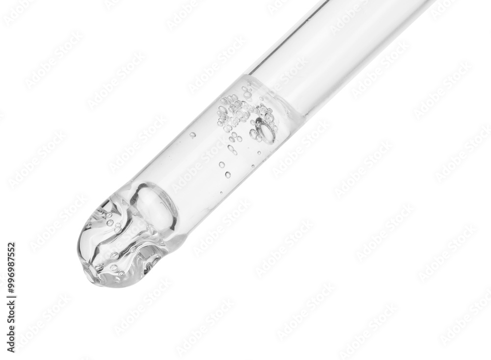 Dripping cosmetic serum from pipette on white background Dripping cosmetic serum from pipette on white background