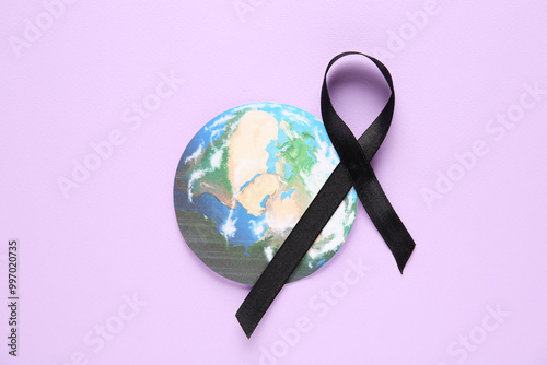 Black ribbon and paper plan...