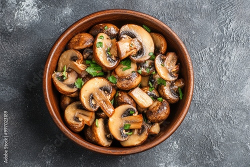 Roasted sliced champignon mushrooms in the bowl - generrative ai photo