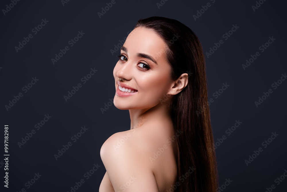 Photo of adorble cheerful lady naked shoulders make up isolated on dark grey color background Photo of adorble cheerful lady naked shoulders make up isolated on dark grey color background