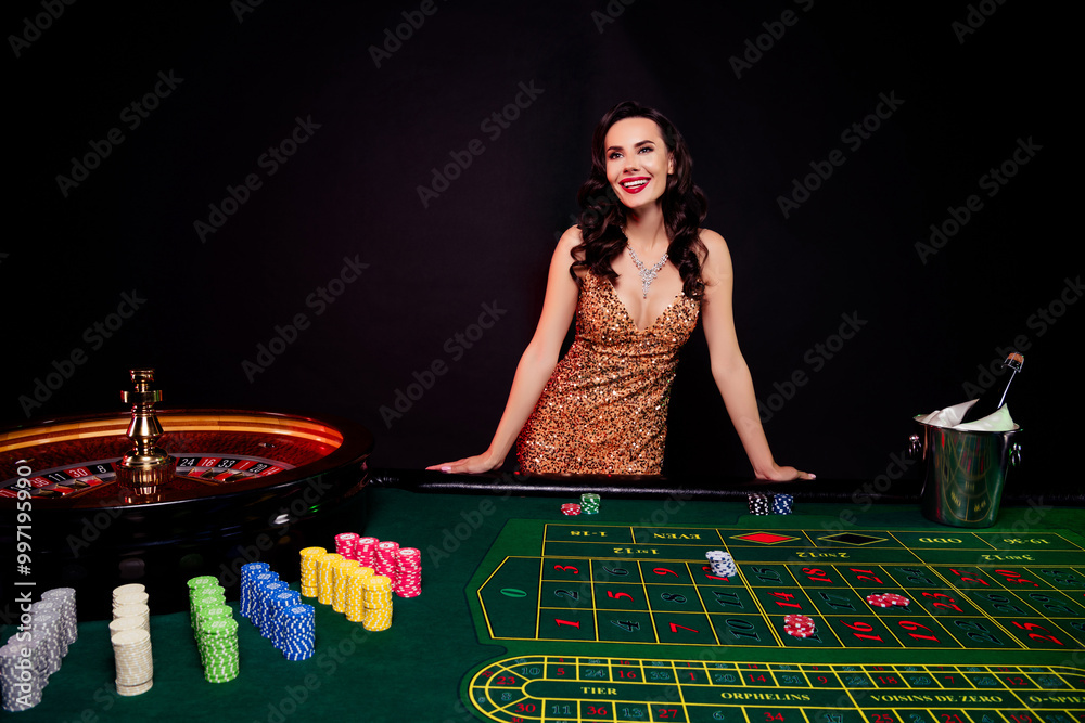 Photo of pretty woman in shiny sequins dress playing poker touching table bet money to win jackpot over dark background Photo of pretty woman in shiny sequins dress playing poker touching table bet money to win jackpot over dark background