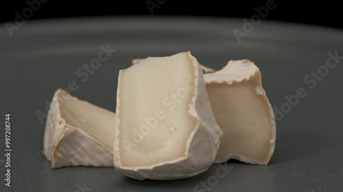 Close-up of camembert or brie cheese on dish.
