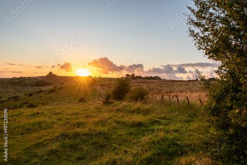 Scenic landscape at Glumslövs Backar / Hilleshögs Dalar nature reserve in Sweden at sunset.