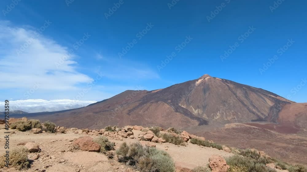 Pico del Teide is a volcanic peak on Tenerife, the highest point in Spain and a UNESCO World Heritage Site, offering breathtaking landscapes and geological significance-hiking in the national park Pico del Teide is a volcanic peak on Tenerife, the highest point in Spain and a UNESCO World Heritage Site, offering breathtaking landscapes and geological significance-hiking in the national park
