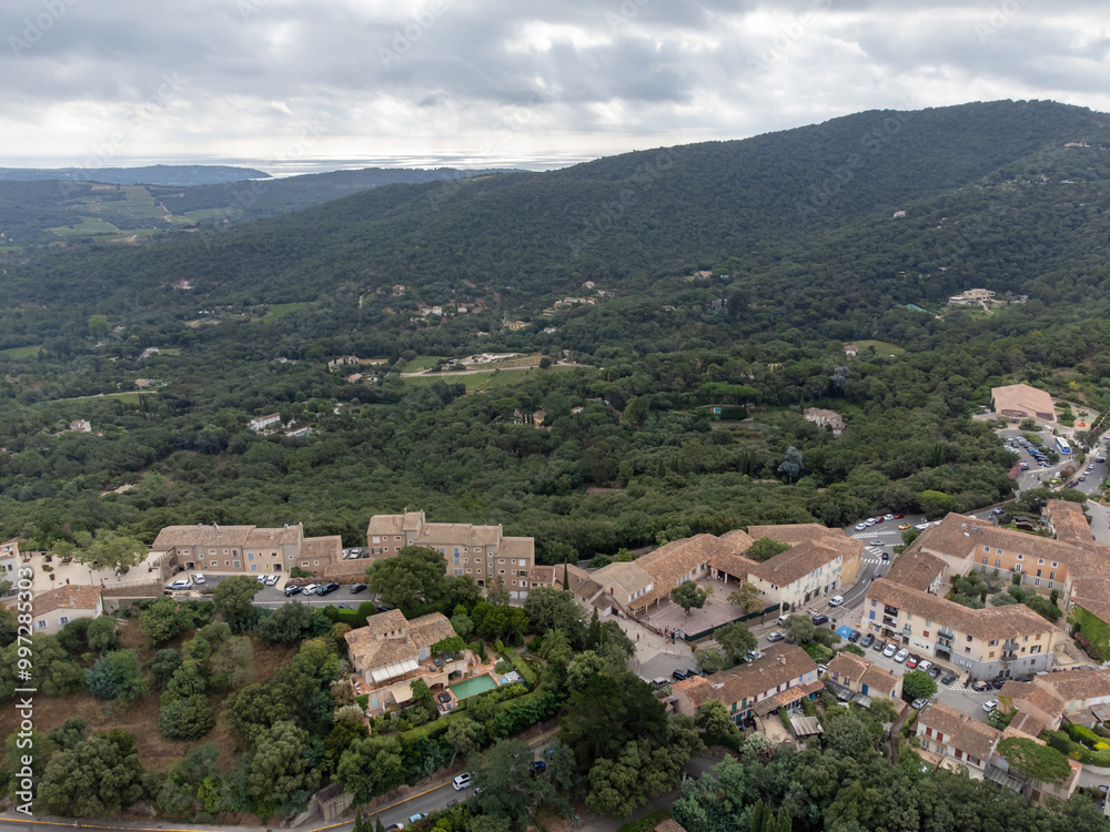 Aerial view on green hills, houses, gulf of saint-tropez, Gassin village, vineyards, Provence, Var, France Aerial view on green hills, houses, gulf of saint-tropez, Gassin village, vineyards, Provence, Var, France