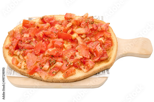 Traditional Italian appetizer,homemade bruscheta with tomatoes and basil served on brown plate, isolated on white background photo