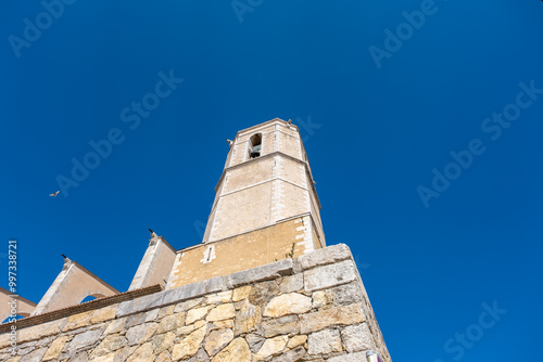 medieval fortified cathedral in Provencal village 